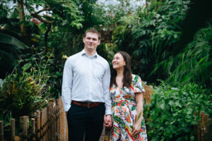 Couple holding hands with fiancee looking at her new fiance