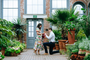 Man proposing to girlfriend at the mobot garden